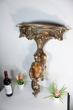 Consolle da parete putti