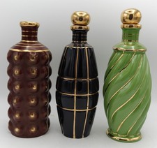 Lotto 3 Bottiglie in Ceramica
