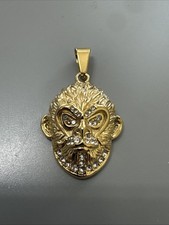 Ciondolo scimmia tono oro