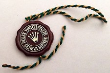 Rolex red swing - tag, seal