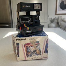 Polaroid Supercolor 635CL fotocamera istantanea nera a strisce arcobaleno in scatola 
