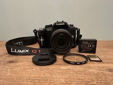 Panasonic DMC-G1 fotocamera digitale con obiettivo Lumix 14-45 G Vario 1:3.5-5.6 FUNZIONANTE