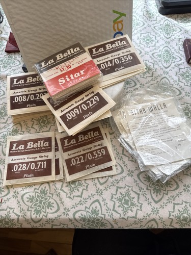 Enorme lotto corde sitar