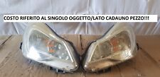 OPEL CORSA D RESTYLING PROIETTORE PROIETTORI FARO FARI LUCE LUCI ANTERIORE DX SX