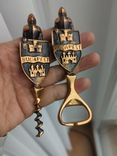 Antico cavatappi e apribottiglie cavaliere in bronzo 