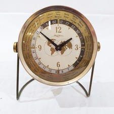 Orologio da tavolo RHYTHM  - ORE DEL MONDO 18 cm