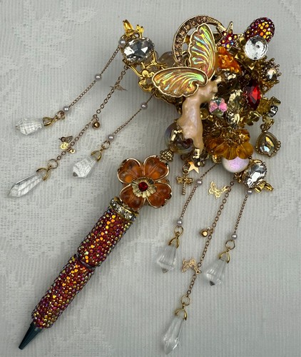 Elegante penna con perline