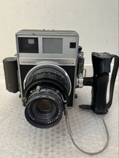 Macchina fotografica pressa