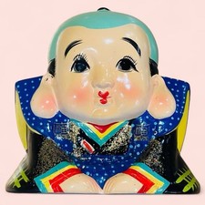 Bambola statuina in ceramica