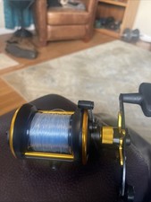 Mulinello Penn Squall II Star Drag - SQLII15SD - Nero e Oro - Mano Destra