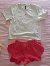 Pantaloncini e t-shirt donna adidas by Stella McCartney