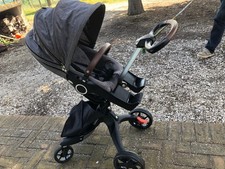 Passeggino duo stokke xplory V6  nero/grigio usato come nuovo