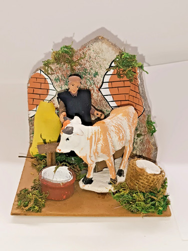 Lattaio con mucca - con,