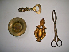 accessori tavola pinza dolce portacenere cavatappi porta stemma alpacca ottone