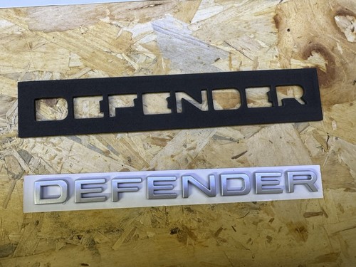 Defender scritte grigio - defender,