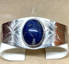 GRANDE BRACCIALE A SCHIAVA IN ARGENTO INCISO E LAPISLAZZULO  UNISEX