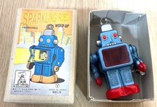 Robot scintillante latta