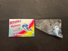 Magiki I Delfini: Personaggio