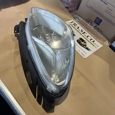 49589 Faro Anteriore DX