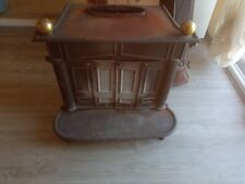 stufa a legna in ghisa usata