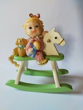 Soprammobile bambino seduto, cavallo a dondolo in resina, nuovo