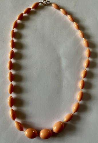 Collana perle resina - in,