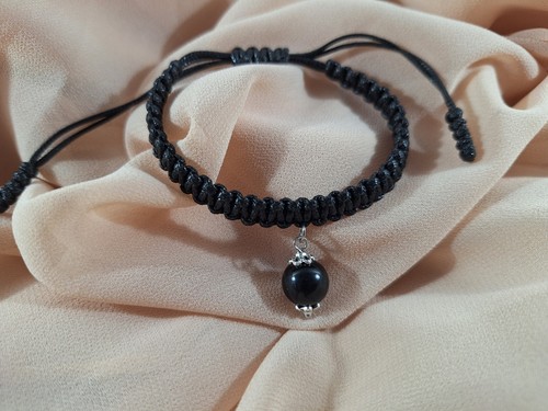 Coccu bracciale sardo fatto - su,