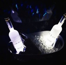 Adhesive under bottle with LED