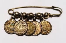 Spilla da balia con monete antica