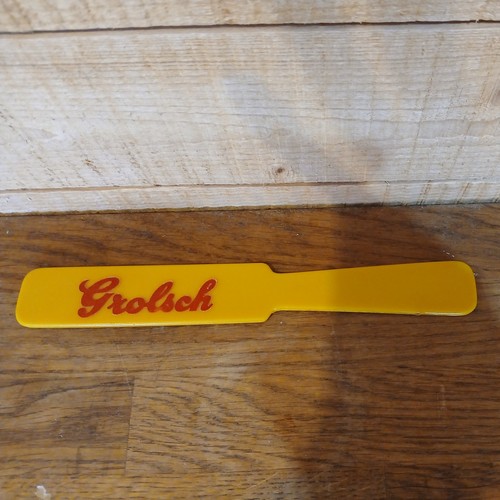 Grolsch yellow beer - yellow,