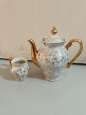 Vecchia caffettiera e lattiera in porcellana Bavaria decorazioni oro zecchino