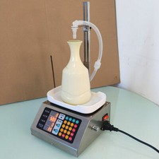 Riempitrice pesa liquidi - pesa,