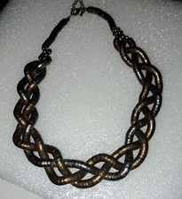 Collana tubolare intrecciata in acciaio e ottone. Bigiotteria Vintage '70 donna