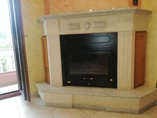 Rivestimento Termocamino in Marmo e Granito.