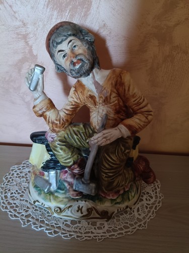 Vecchia statua grande - , operaio