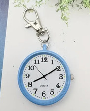 - orologio al quarzo portachiavi colorato - perfetto, nuovo - diam. 40 mm.