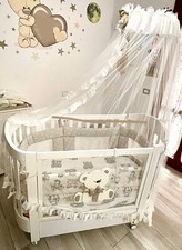 Lettino, Culla, marca Erbesi bimbo/a modello Tato ovale in legno bianco.