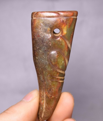 Amuleto pendente testa