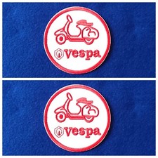 A Pair Of Vespa Scooter