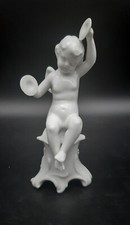 Putti suonatori porcellana