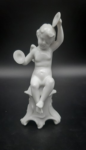 Putti suonatori porcellana