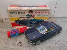 Giocattolo auto in latta vintage Yonezawa BMW 2000 CS a batteria.Giappone anni 60.riparazioni