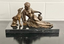 Scultura in bronzo Dama con