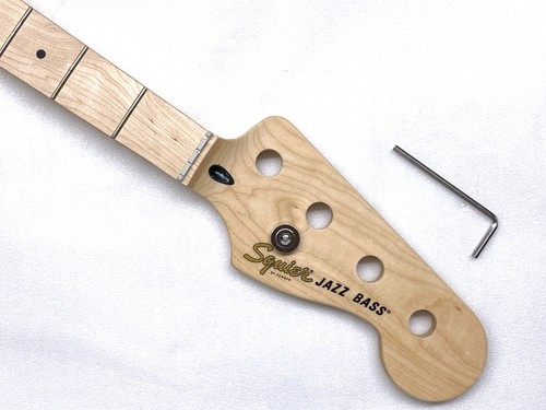 Dinged fender squier - jazz, j