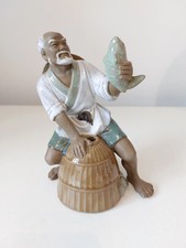 Statuina pescatore mudman