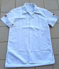Camicia pantaloni bianchi