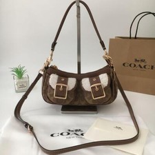 Borsa Coach Ashton Baguette in tela firmata marrone chiaro/naturale CY658 Out...