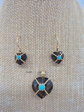 Set pendenti e orecchini 18