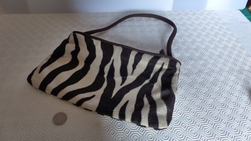 Borsetta leopardata come - , in