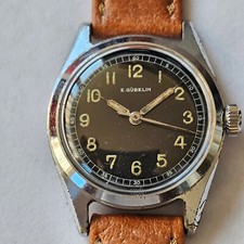 E.GUBELIN-CARICA MANUALE-CASSA A VITE-TIPO MILITARE-RARISSIMO-SWISS MADE-FIRMATO